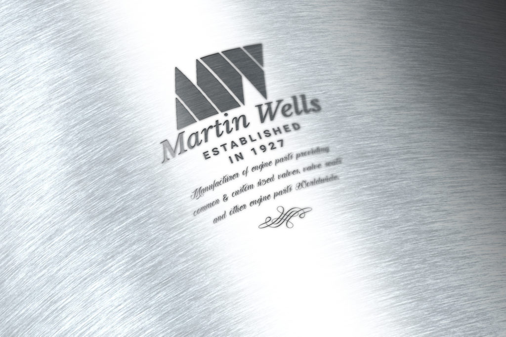 Martin Wells brushed metal sign